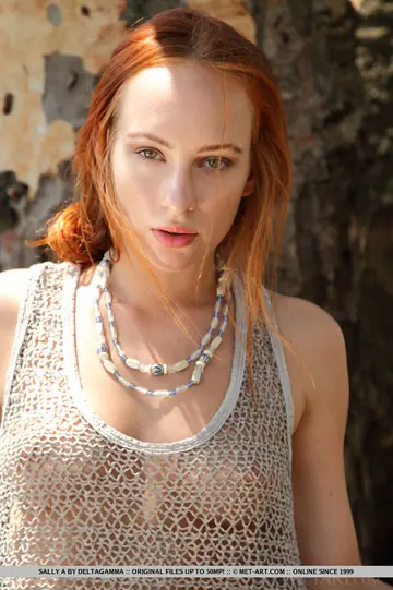Sally A – European Redhead Bares Her Hairy Pussy in the Forest