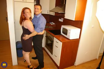 Curvy Redhead MILF Joins Two Men for a Threesome