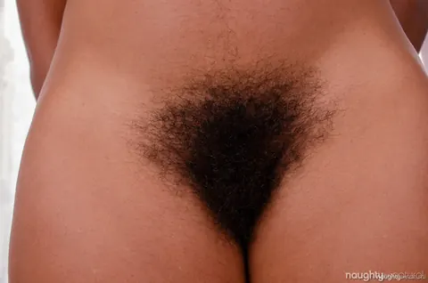 Oya: Ebony BBW Undresses to Show Her Hairy Pussy and Tattoos – photo 13 of 21