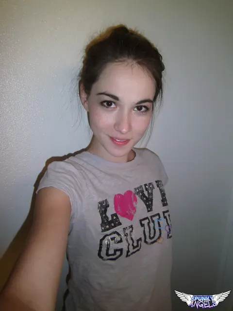 Emily Grey: Brunette Peels Off Her Shorts for a Selfie – photo 1 of 12