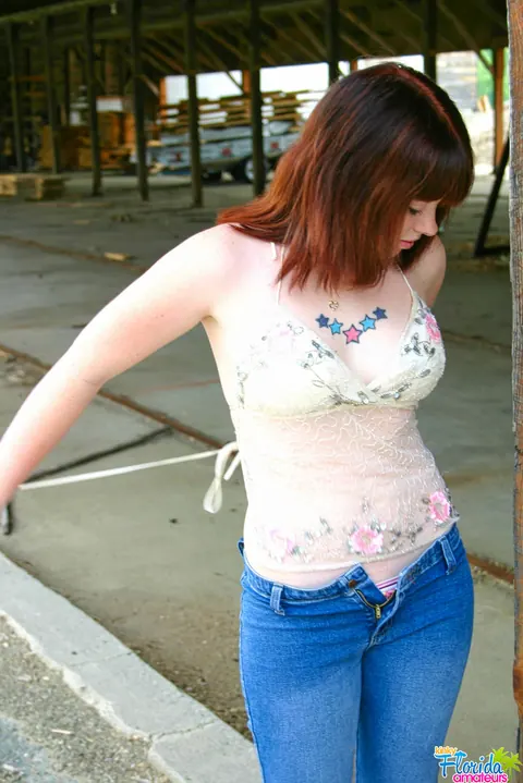 Redhead with Big Tits Bares Her Chest at a Construction Site – photo 7 of 12