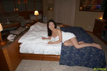Busty Asian MILF Drops Her Robe and Spreads Her Hairy Pussy