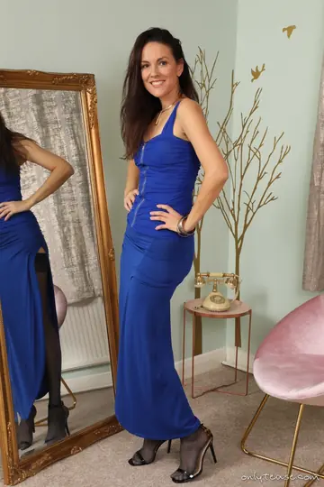 Brunette Strips Out of Her Dress in Stockings and Heels