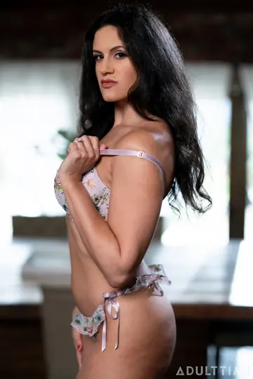 Trans Woman Strips Nude and Displays Her Body in Posed Shots