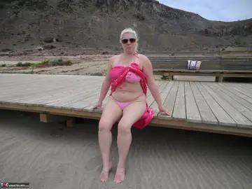 Mature Curvy Blonde Flashes Her Bikini Body at the Beach