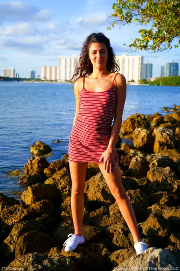 Tall Brunette with Small Natural Tits Reveals Her Body on the Beach