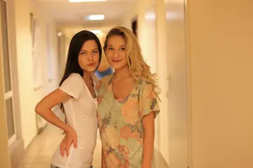 Candice B – Busty Blonde and Brunette Lesbians Lick and Finger in the Hotel Hallway