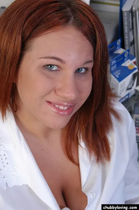 Alyssa West: Chubby Redhead Bares Her Big Natural Tits in the Office – photo 2 of 16