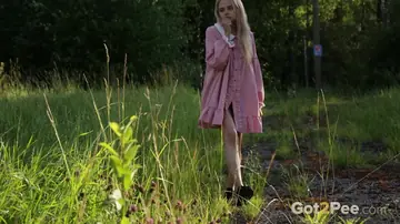 Blonde Pisses on Iron Stairs in Her Skirt