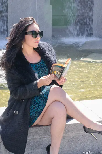 Nikki Silver – Busty Brunette in Glasses Poses in a Dress and Heels Outdoors