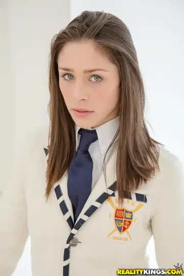 Anna Morna – Tall Brunette in Uniform Skirt Spreads Her Pussy