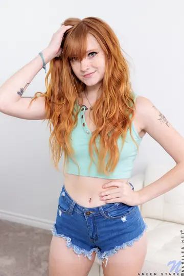 Amber Stark – Curly Redhead Strips Out of Her Shorts and Spreads Her Pussy