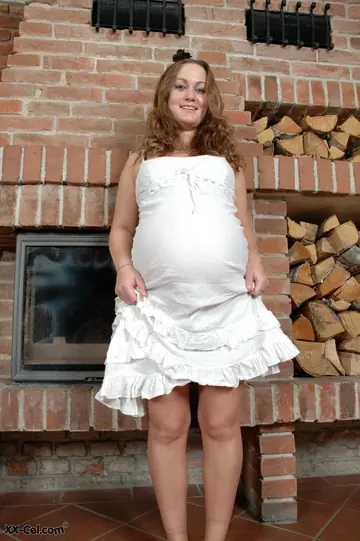 Pregnant Amateur MILF Lifts Her Skirt to Show Belly and Spreads Her Pussy