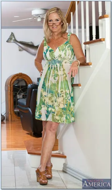 Annabelle Brady – Busty Blonde MILF in Glasses Strips Out of Her Skirt