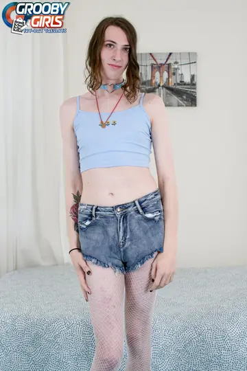 Brunette Trans Woman in Fishnets Shows Off and Has Sex