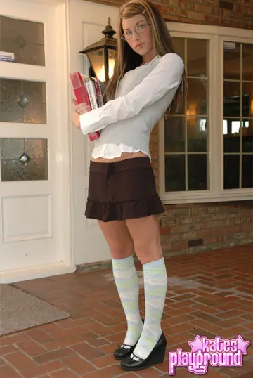 Kates Playground – Blonde in Glasses Sheds Her Skirt for Socks on the Porch