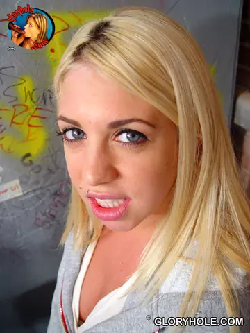 Busty Blonde Sucks and Fucks a BBC at the Gloryhole