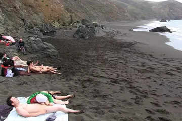 Two Men Bound Outdoors in a Public Place