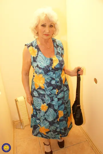 Blonde Granny in Stockings Sucks Cock Through Gloryhole and Takes Anal Doggy