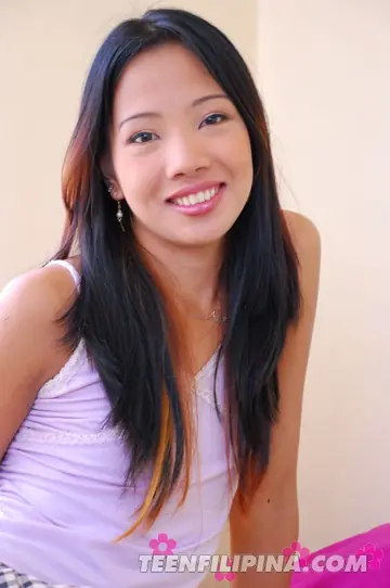 Slim Asian Woman Strips Out of Her Panties in White Socks