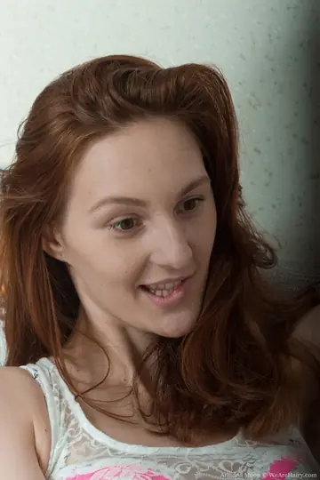 Ariadna Moon – Pale Redhead in Lingerie and Socks Spreads Her Hairy Pussy