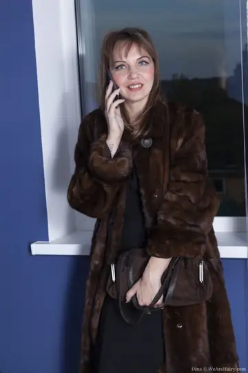 Thick Brunette Lifts Her Skirt to Show Her Hairy Pussy