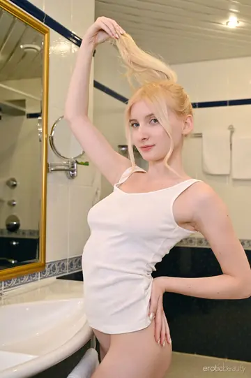 Blonde with Natural Tits Spreads Her Pussy Wide in the Bathroom