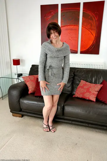 Slim Short-Haired Mature Woman Spreads Her Hairy Pussy