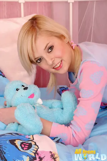 Blonde with Pigtails Pulls Panties Aside and Toys Her Ass