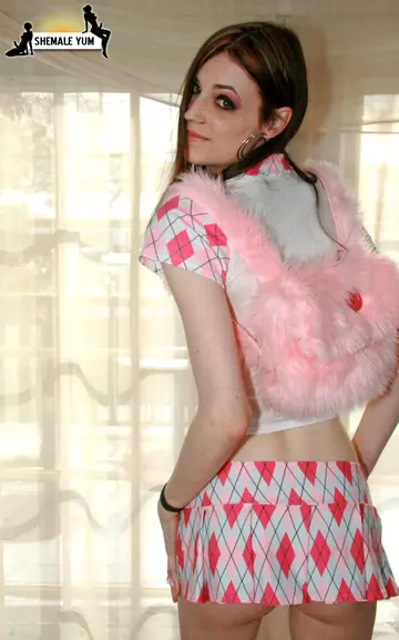 Slim Trans Woman Peels Off Her Top and Poses Nude