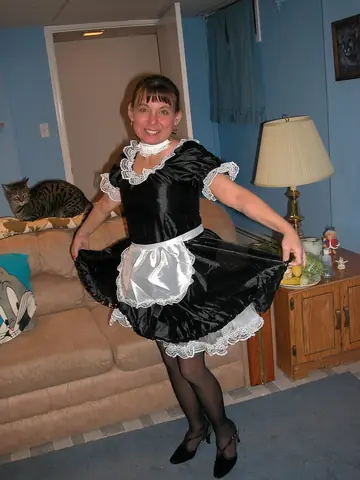 Slim Mature Maid Masturbates with a Dildo in Stockings