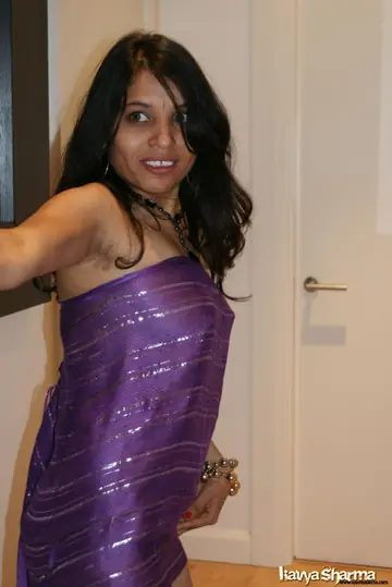 Kavya Sharma – Brunette Indian MILF Lifts Her Skirt to Show Off Her Legs