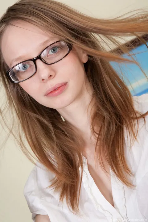 Secretary in Glasses Strips in the Office – photo 4 of 11