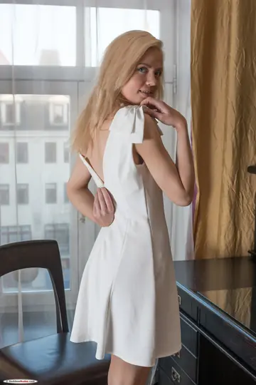 Blonde in High Heels Strips Nude and Spreads Her Pussy
