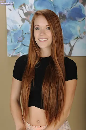 Redhead Pulls Panties Aside and Spreads Her Pussy