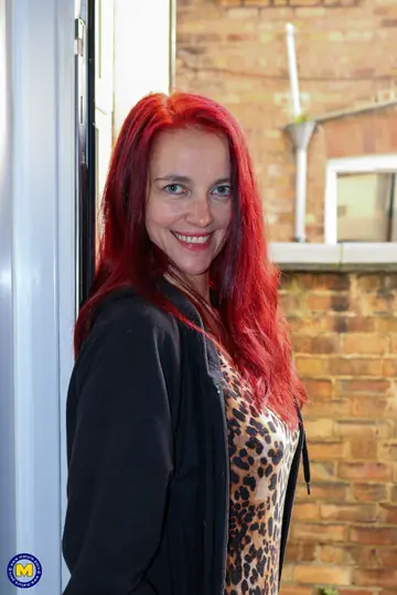 Busty Mature Redhead Strips Out of Her Lingerie and Spreads Her Pussy