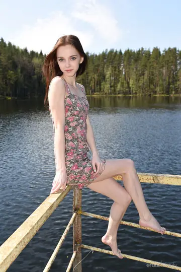 Skinny Brunette Strips Out of Her Skirt at the Lake