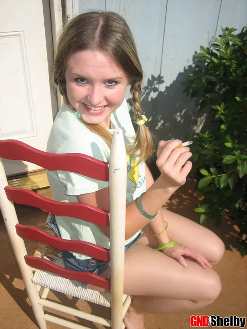 Woman in Pigtails Pulls Panties Aside Outdoors – photo 7 of 12