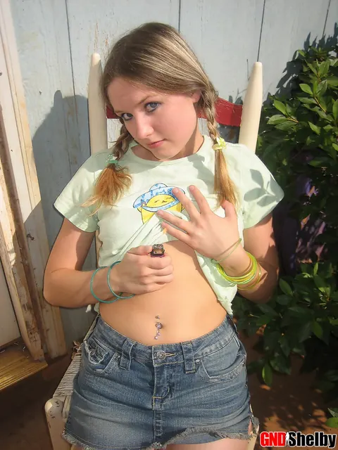 Woman in Pigtails Pulls Panties Aside Outdoors – photo 12 of 12