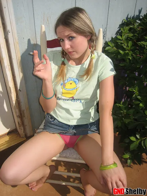 Woman in Pigtails Pulls Panties Aside Outdoors – photo 10 of 12