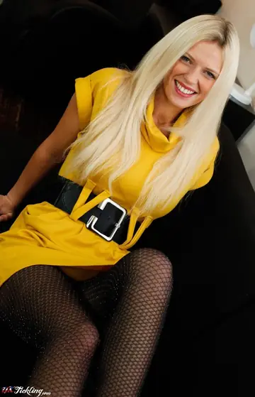 Sofia Lee – Busty Blonde Shows Off Her Stocking Feet in a Leather Skirt