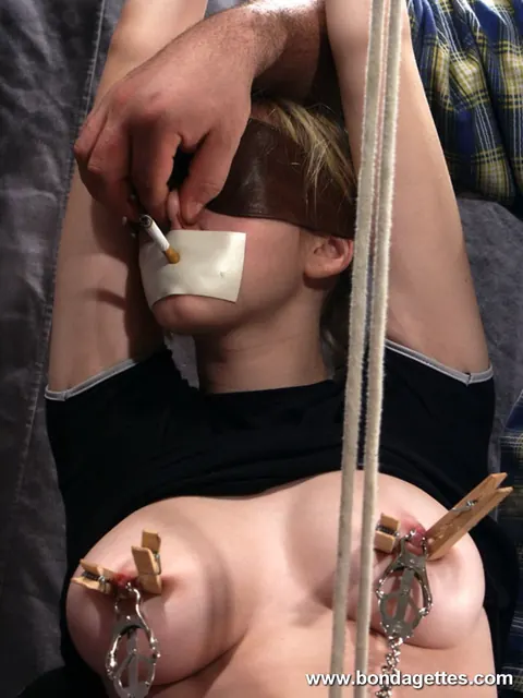 Busty Blonde Smokes a Cigarette While Bound in Panties – photo 16 of 16