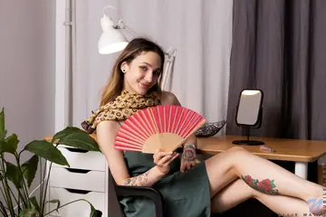 Ellie Wain – Tattooed Brunette Strips Off Her Skirt and Fingers Her Pussy