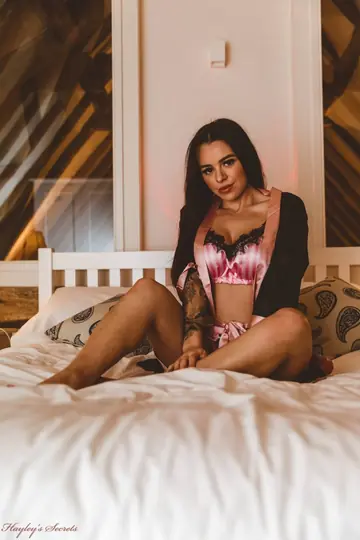 Mia Stryker – Tattooed Brunette Strips Out of Her Lingerie and Shorts on the Bed