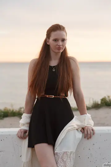 Petite Redhead Flashes Her Panties Under a Dress on the Beach