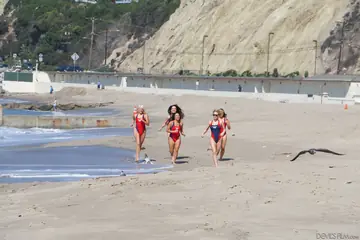 Kagney Linn Karter – Busty Blonde in a Bikini and Glasses Joins Lesbian Threesome on the Beach