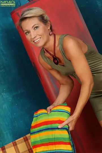 Janet Darling – Mature Blonde in a Skirt Pulls Her Panties Aside and Fingers Her Hairy Pussy