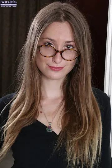 Woman in Glasses Pulls Her Panties Aside and Spreads Her Hairy Pussy