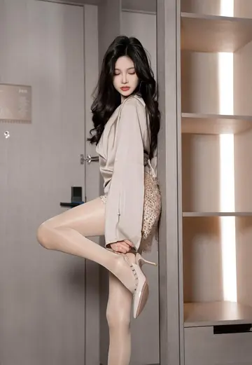 Petite Asian Woman Poses Nude in Stockings and Heels
