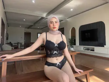 Asian Woman with Big Natural Tits Poses Nude
